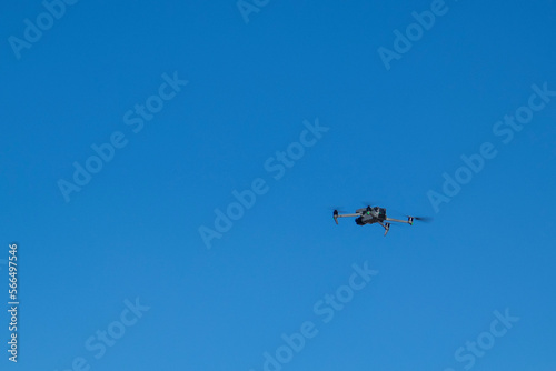 Fototapeta Naklejka Na Ścianę i Meble -  the quadcopter is in the air. quadcopter in the blue sky