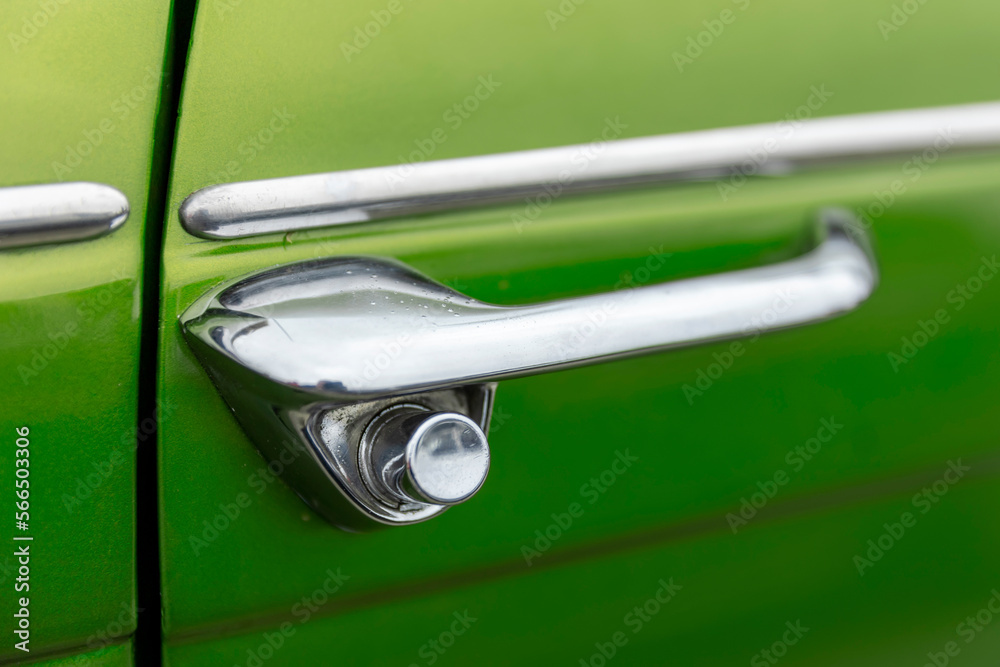 Classic retro style car door handle and keyhole Classic retro style car door handle and keyhole