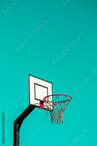 Street basketball hoop on background of vibrant sky. Creative minimalistic photo. Street Basketball Loop Basket Outdoors Abstract sport wide blank empty background texture, copy space. Sports, leisure