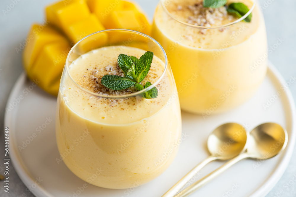 Lassi mango, traditional indian drink, selective focus Lassi mango, traditional indian drink, selective focus