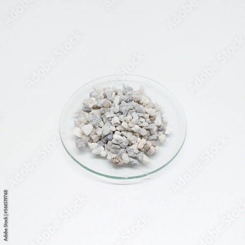Pile of Gravel aggregate of more or less rounded rock fragments coarser than sand used for water treatment filter photo