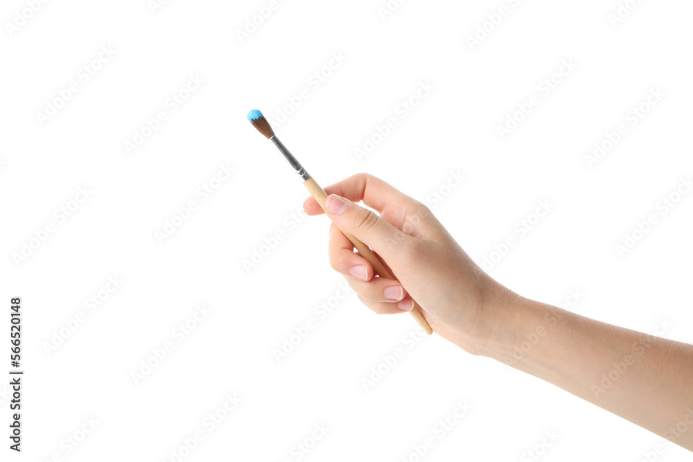 Female hand holding paintbrush with paint, isolated on white background Female hand holding paintbrush with paint, isolated on white background