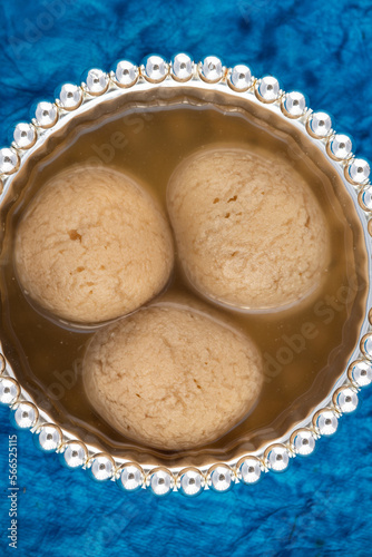 Indian Mithai Gurer Rosogolla Also Called Rasgulla, Rasagola, Rosgola, Roshogolla, Rossogolla, Rasbhari Or Rasbari Is Ball Shaped Dumpling Made Of Chhena, Sugar Syrup, Gud, Chena, Panir, Paneer, Gur photo