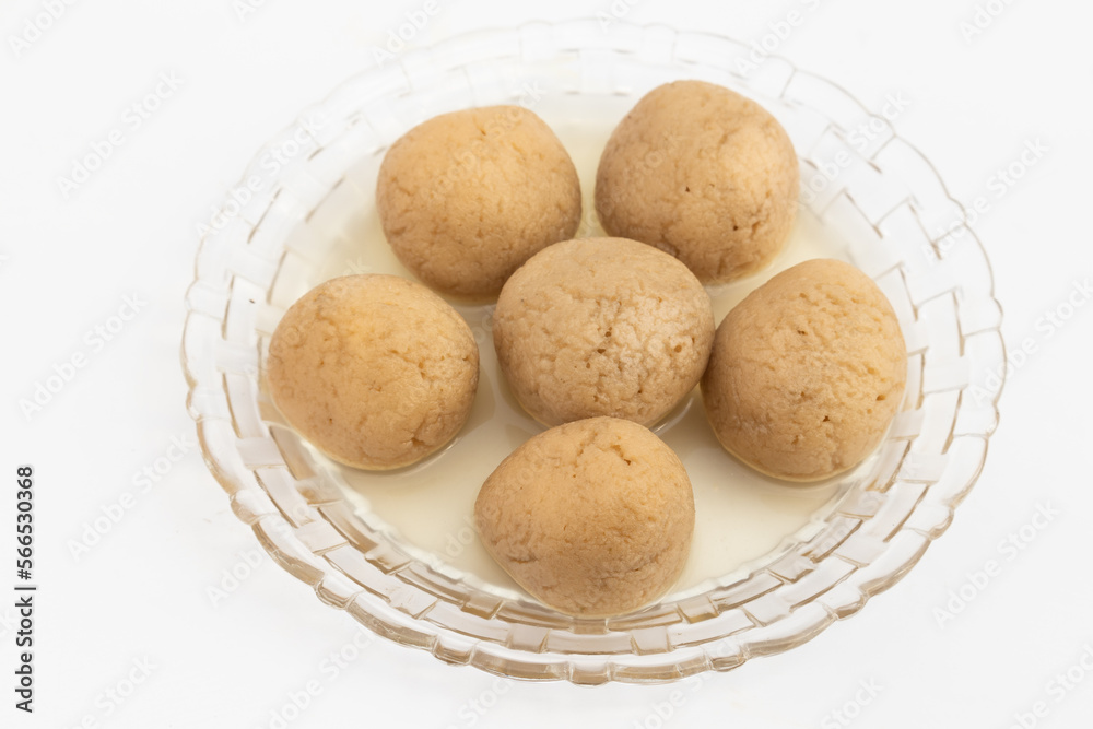 Indian Mithai Gurer Rosogolla Also Called Rasgulla, Rasagola, Rosgola, Roshogolla, Rossogolla, Rasbhari Or Rasbari Is Ball Shaped Dumpling Made Of Chhena, Sugar Syrup, Gud, Chena, Panir, Paneer, Gur Indian Mithai Gurer Rosogolla Also Called Rasgulla, Rasagola, Rosgola, Roshogolla, Rossogolla, Rasbhari Or Rasbari Is Ball Shaped Dumpling Made Of Chhena, Sugar Syrup, Gud, Chena, Panir, Paneer, Gur
