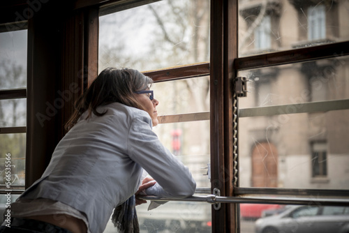 Woman Travel in a Tram in Milan, Lombardy in Italy.
