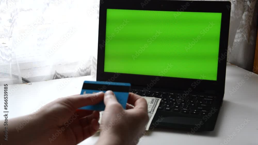 green screen laptop card bank money. High quality FullHD footage green screen laptop card bank money. High quality FullHD footage