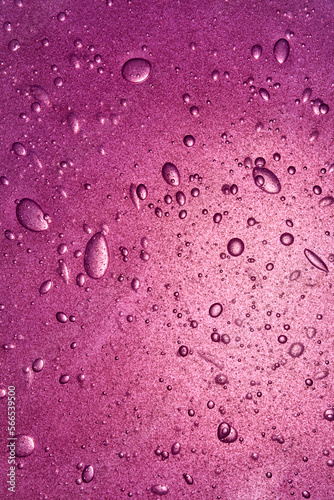 Bubbles in purple liquid gel, cosmetic product.