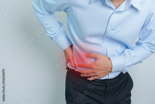 man having back pain. Urinary system and Stones, Cancer, world kidney day, Chronic kidney stomach, liver pain and pancreas concept
