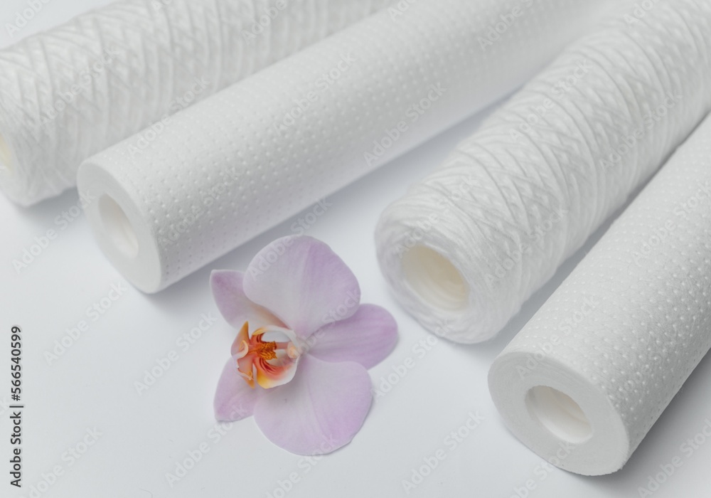 Cartridges for water treatment systems on white background. Cartridges for water treatment systems on white background.