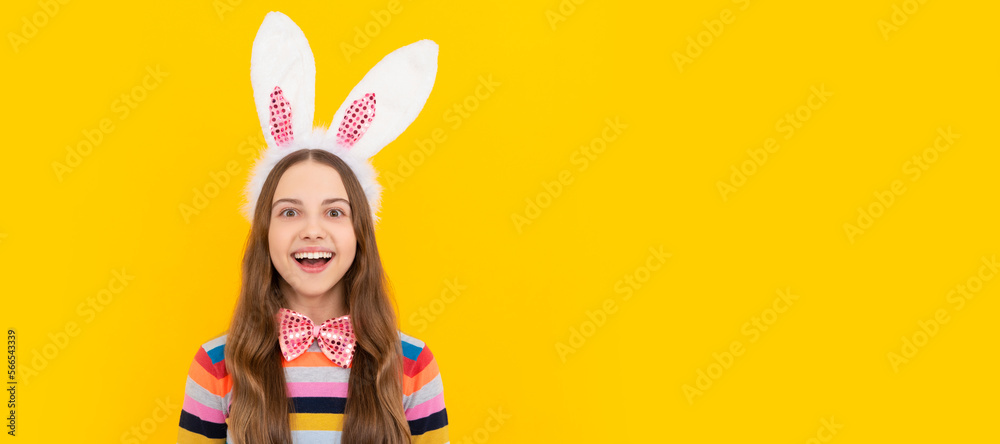 happy easter kid in bunny ears and bow tie on yellow background. Easter child horizontal poster. Web banner header of bunny kid, copy space. happy easter kid in bunny ears and bow tie on yellow background. Easter child horizontal poster. Web banner header of bunny kid, copy space.