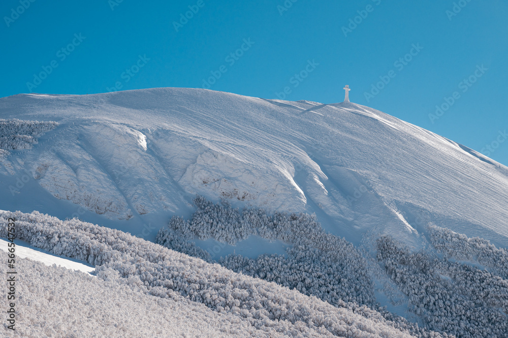 Italy, January 2023 - beautiful winter landscape on mount Catria after a heavy snowfall and frost. It expresses well the concept of peace, silence and freedom in nature