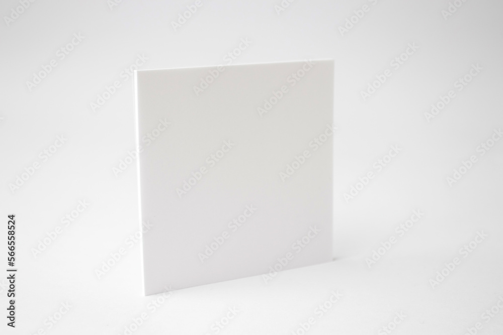A blank square white empty paper on white background A blank square white empty paper on white background