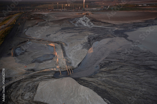 Tailings Pond outflow pipes from the Bitumen Separation Plant, Suncor Millenium oil sands mine north of Fort McMurray, Alberta,