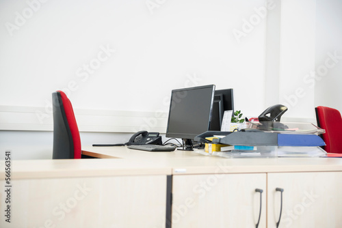 Modern empty office desk computer monitor
