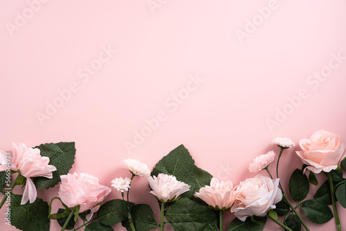 Valentine's Day and Mother's Day design concept background with pink flower and gift on pink background.