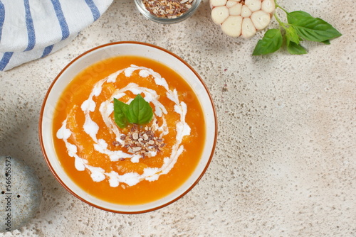 Pumpkin creamy soup served in bowl	