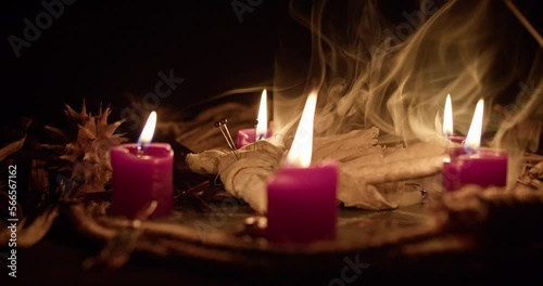 A voodoo ritual with a scary doll. Close-up shot.