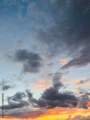 Amazing sky after the sunset, colored clouds, purple, orange, yellow, blue. Natural heavens background © Oksana