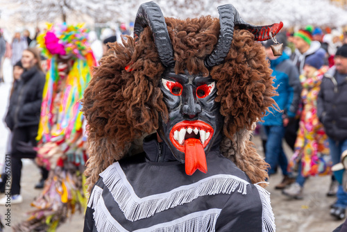 Gody Zywieckie 2023 - traditional winter parade of 'Dziady', 'Jukace', folk custom in Zywiec region, man dressed in traditional costume of devil, Milowka, Poland
