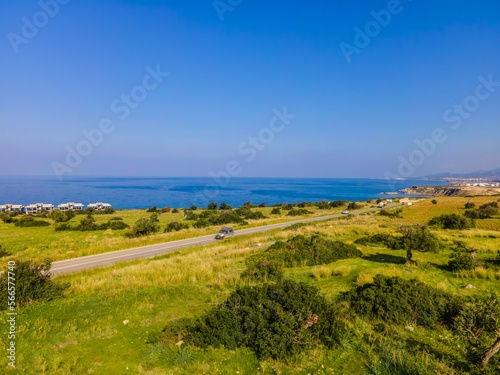 Sea view lands in green field in Esentepe, North Cyprus photo