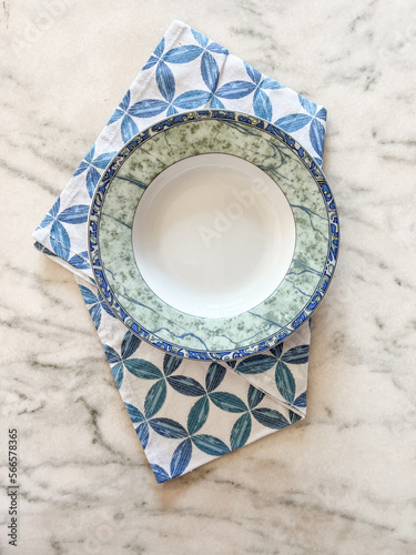 plate on tablecloth for food on a marbel background
