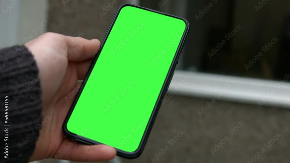 Male Hand Holding Smart Phone Green Screen Replacement 4K
