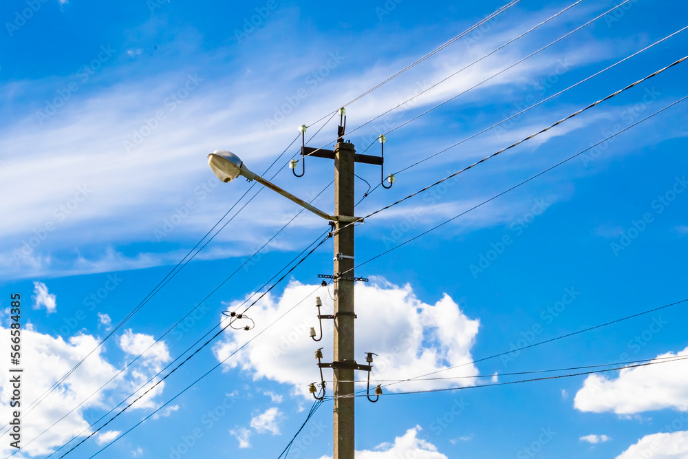 Power electric pole with line wire on colored background close up Power electric pole with line wire on colored background close up