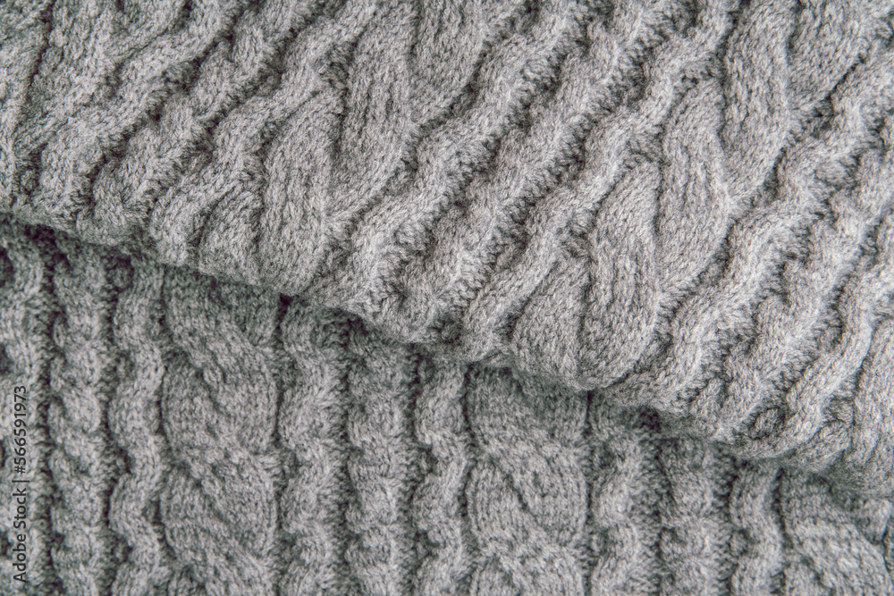 Wool fabric background, knitted texture. Close-up, full frame. Wool fabric background, knitted texture. Close-up, full frame.