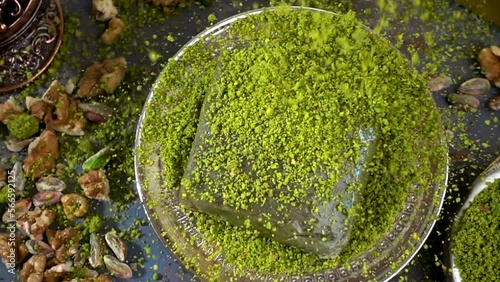 Traditional turkish baklava pistachio pastry. Dilberdudagi, ozel kesim baklava, cikolatali baklava, fistikli baklava, katmer, fistikli kadayif, kattafi, fistik sarma, soguk baklava, midye baklava, cev photo