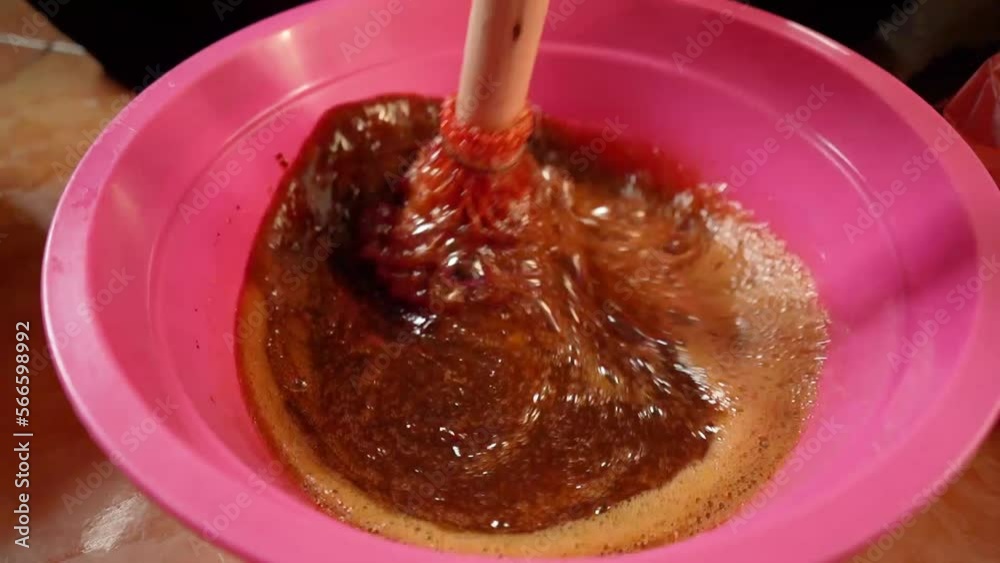 Kneading the cake batter in the traditional way. Kneading the cake batter in the traditional way.