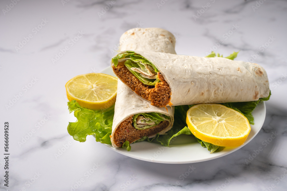 Raw meatballs between lavash are a traditional Turkish dish. Stock