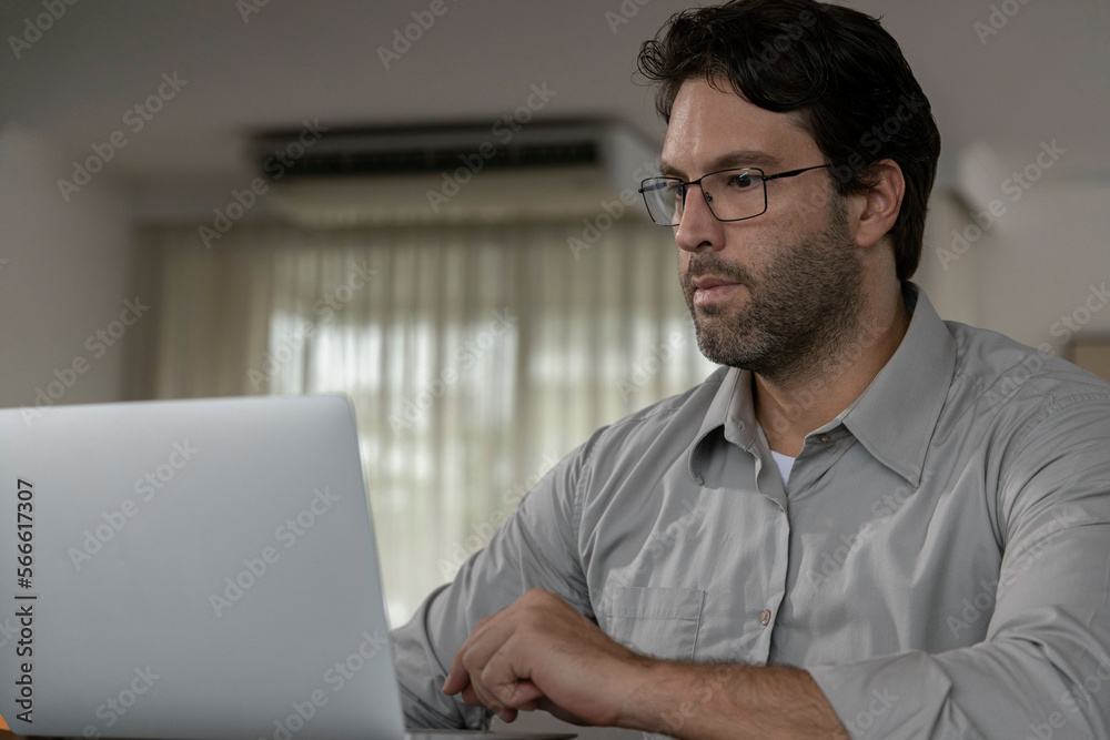 Fototapeta premium Brazilian man working at home
