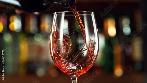 Billede på lærred Detail of pouring red wine into glass.