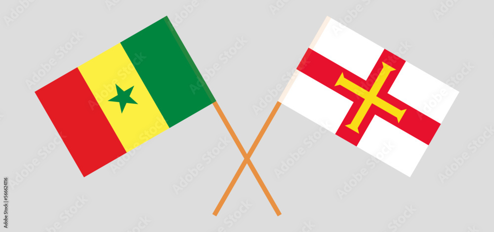 Crossed flags of Senegal and Bailiwick of Guernsey. Official colors. Correct proportion