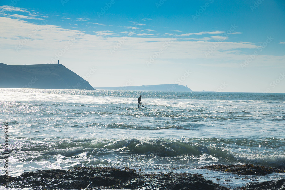 Naklejka premium surfer out at sea