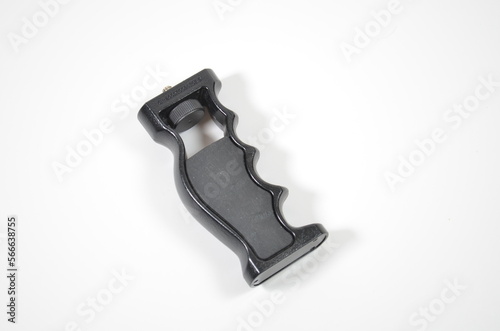 a gun handle, black plastic revolver handle isolated