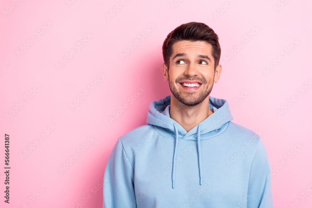 Portrait of joyful nice man wear fashionable clothes interested look empty space special deal low prices isolated on pink color background Portrait of joyful nice man wear fashionable clothes interested look empty space special deal low prices isolated on pink color background