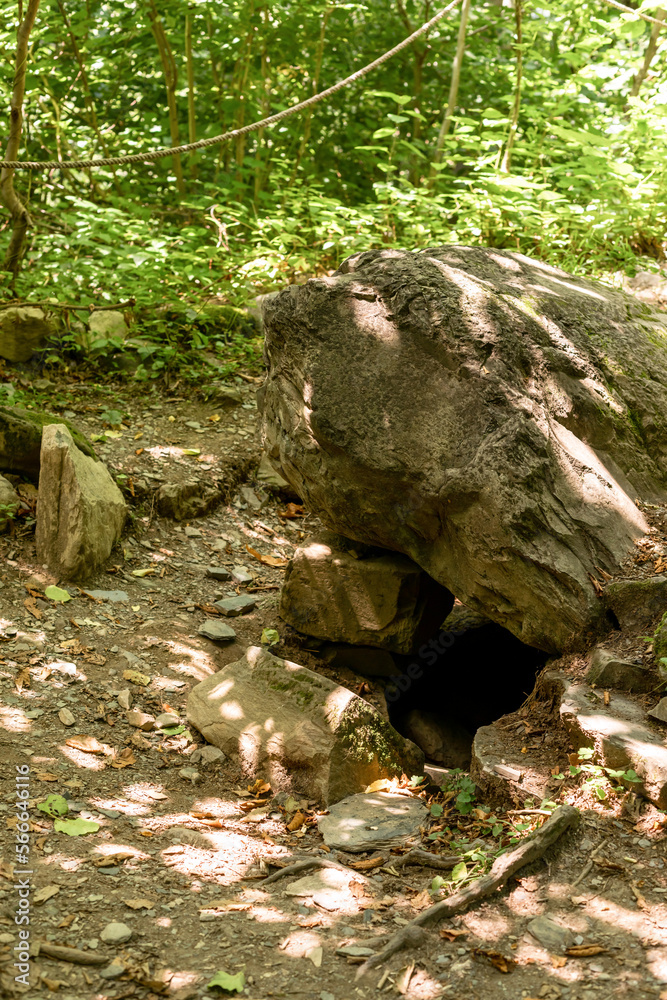 Dolmens, structures made of monolithic stone slabs weighing several tons in Adlersky Krasnaya Polyana and district in summer Dolmens, structures made of monolithic stone slabs weighing several tons in Adlersky Krasnaya Polyana and district in summer