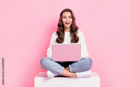 Full length photo of shiny impressed lady wear white sweater chatting instagram twitter telegram isolated pink color background © deagreez