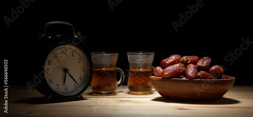 Concept: Ramadan food Sweets mixed of dried fruits , Dates premium dates, full of date fruits, Arabic coffee, Concept: month fasting culture Muslim prayer, 1444 Puasa Ramadan Kareem greeting festiva
