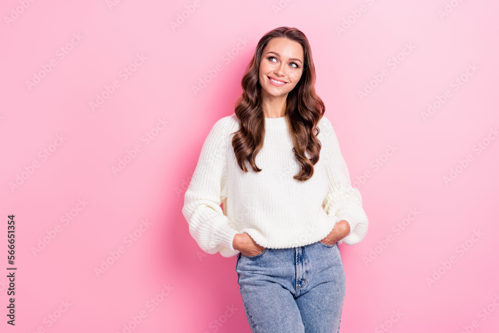 Photo of lovely cute lady beaming smile put hands pockets look empty space isolated on pink color background Photo of lovely cute lady beaming smile put hands pockets look empty space isolated on pink color background
