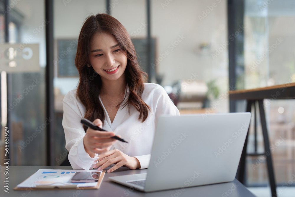 Portrait of business accountant using laptop for analyze financial data. finance, tax, accounting concept Portrait of business accountant using laptop for analyze financial data. finance, tax, accounting concept