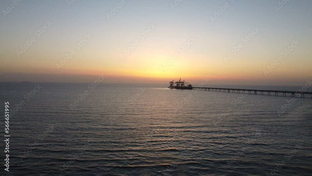 Summer sunset views of the Mediterranean sea. Clear blue sky with aerial capture