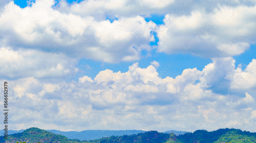 The sky is bright blue with beautiful fluffy clouds. blue sky with clouds The sky is bright blue with beautiful fluffy clouds. blue sky with clouds