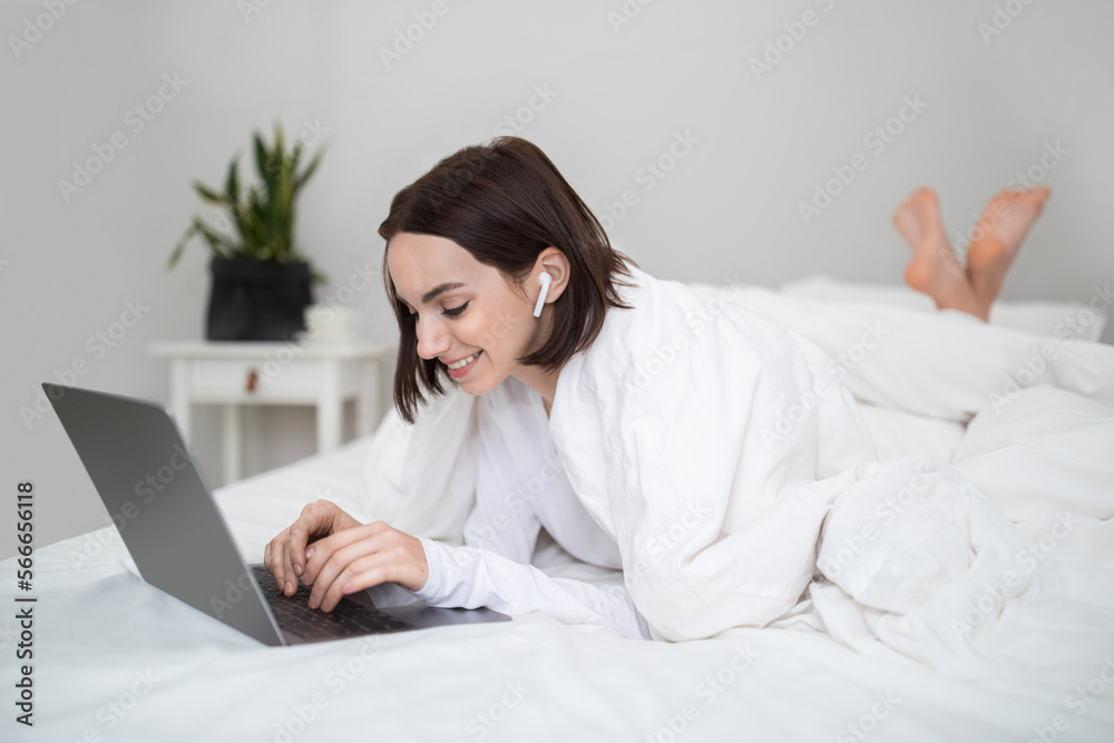 Happy young woman freelancer working from home Happy young woman freelancer working from home