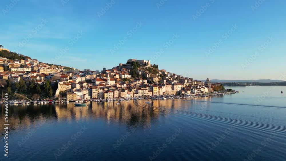 Aerial drone view of Sibenik town in Croatia during beautiful sunset colors. Vacations and holidays on the seacoast. The Cathedral of St James in Sibenik Unesco. Aerial drone view of Sibenik town in Croatia during beautiful sunset colors. Vacations and holidays on the seacoast. The Cathedral of St James in Sibenik Unesco.