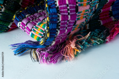 Handmade textile detail made by Guatemalan artisan in Central America, colorful detail full of tradition and culture, colonial history, Mayan cosmovision. 