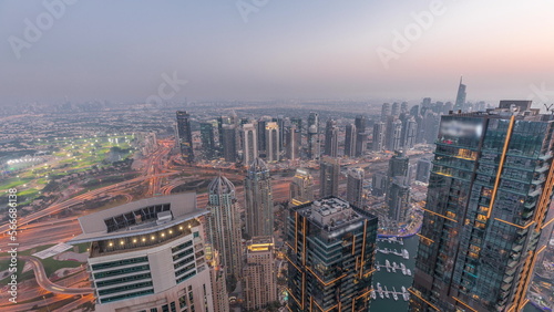 Panorama of Dubai Marina with JLT skyscrapers day to night , Dubai, United Arab Emirates.