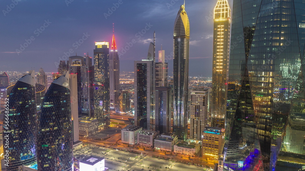 Naklejka premium Financial center of Dubai city with luxury skyscrapers day to night , Dubai, United Arab Emirates