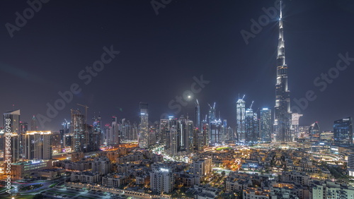 Dubai Downtown all night with tallest skyscraper and other towers